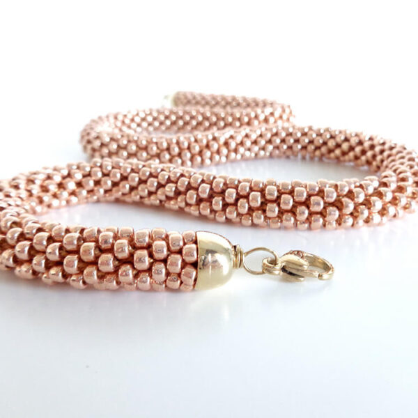 Collana monocolore di alta bigiotteria color oro rosa chiaro, Modello Snake