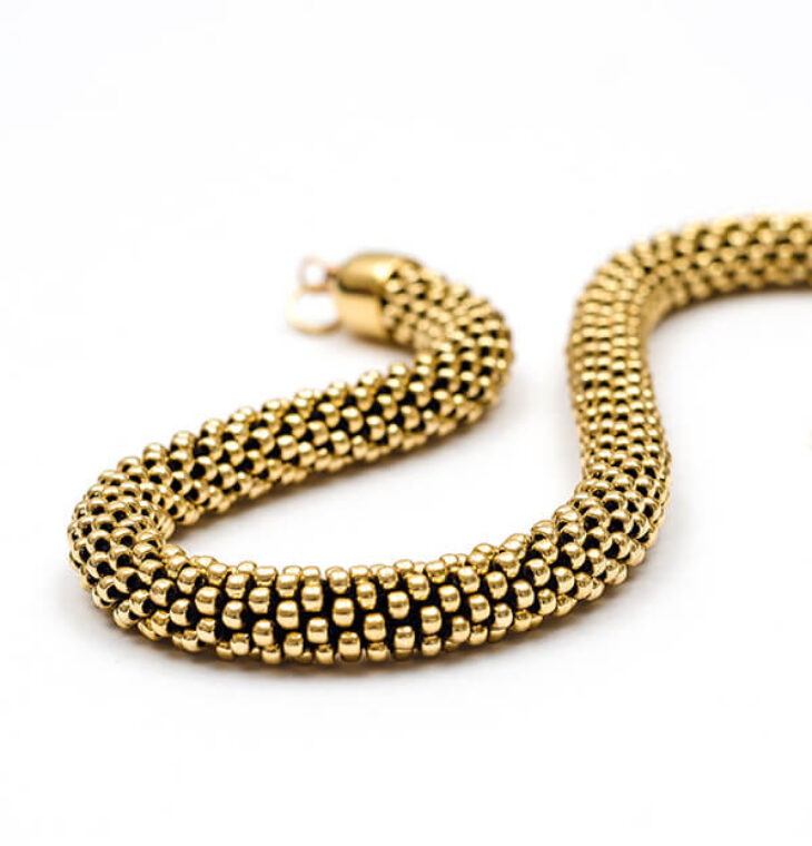 Collana monocolore di alta bigiotteria color oro, Modello Snake