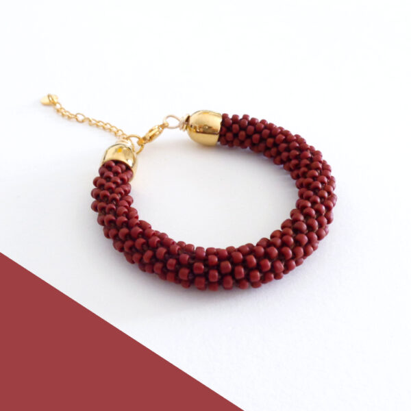 Bracciale tubolare rosso vino modello "Snake"