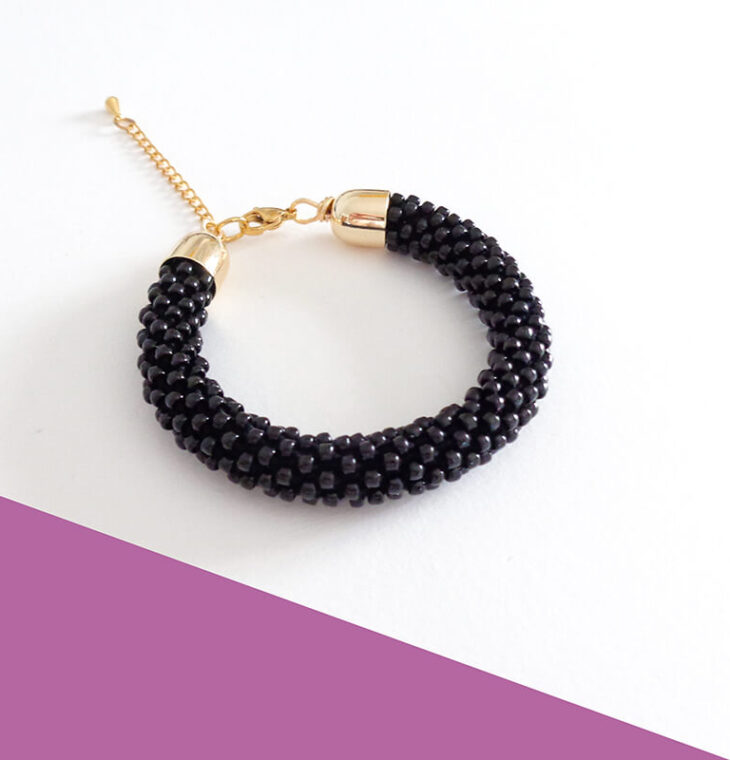 Bracciale tubolare nero, modello "Snake" - immagine 2