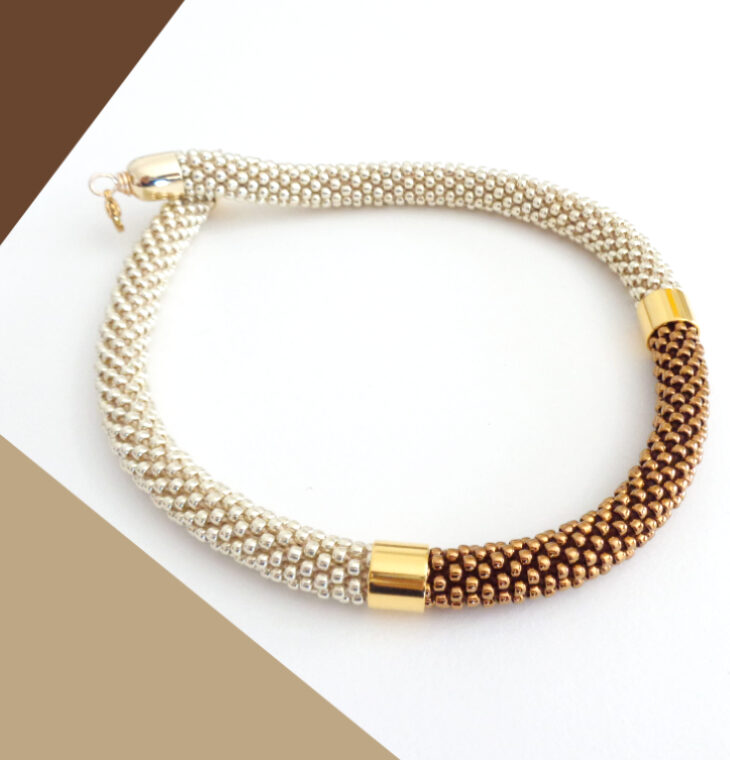 Collana bicolore di alta bigiotteria alluminio chiaro e bronzo, modello Virtù Nascoste