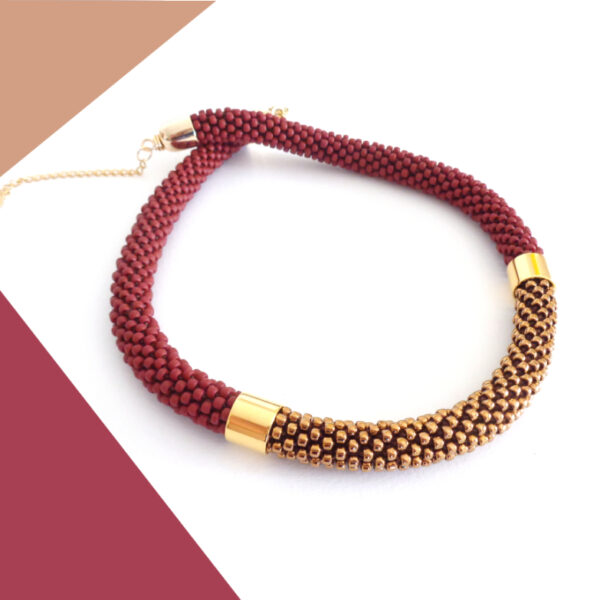 Collana bicolore di alta bigiotteria rosso vino e bronzo modello Virtù Nascoste